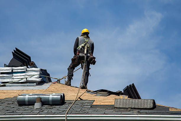 Professional Roofing technician working in Russia, OH